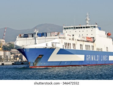 GENOA, ITALY - NOVEMBER 2, 2015: Eurocargo Malta Is A RoRo Ferry Cargo Company Inarme The Grimaldi Group, Built In Hyundai Mipo Shipyard In Ulsan, South Korea. The Ship Enters The Port. 