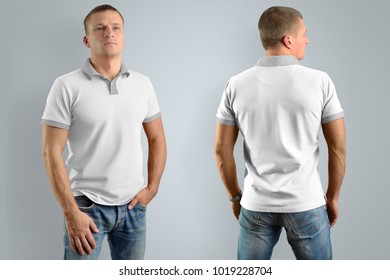 Gent Young Man In The White Polo Shirt And Blue Jeans  Isolated On The Gray Background, Front And Back View. Mockup For Your Graphic Design Or Logo.