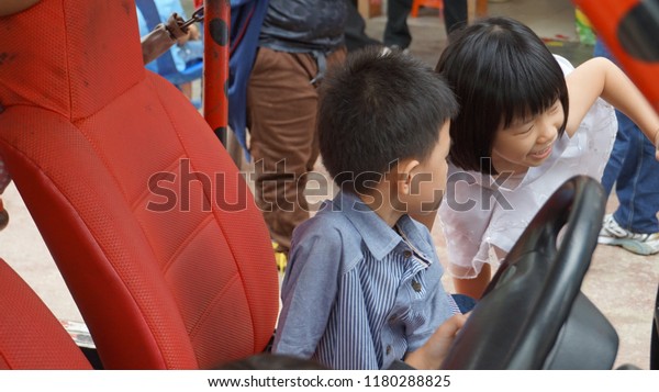 Genting Highland Strawberry\
Park / Malaysia - September 9 2018: Kids playing in amusement park\
car