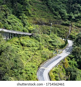 Genting Highlands Is A Popular Tourist Attraction In Kuala Lumpur, Malaysia. An Ariel View Of Genting Highlands From The Cable Car. Cloudy, Moody Green Look Of Genting Highlands, Malaysia