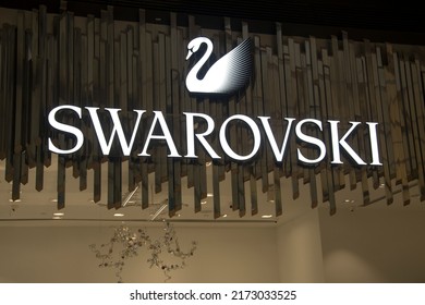 Genting, Malaysia - Jun 10, 2022: Swarovski swan symbol and logo on a store front in Genting Highlands, Malaysia.