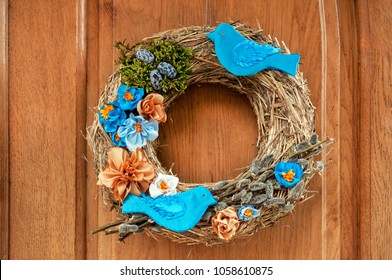 A Gentle Easter Wreath Hangs On The Door