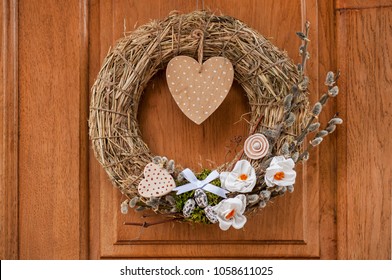 A Gentle Easter Wreath Hangs On The Door