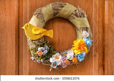 A Gentle Easter Wreath Hangs On The Door