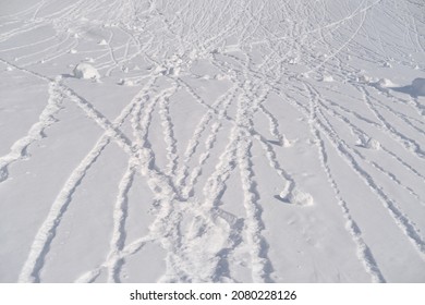 gentle slope of mountain, white snow lies on flat surface, lumps of snow roll down, snow-covered fluffy ground, texture of snowdrift, beautiful winter landscape, snowfall - Powered by Shutterstock