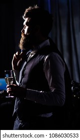 Gentleman with confident face holds champagne glass. Rich lifestyle, success, fashion, wealth, alcohol, pleasure concept. Politician with long beard. Entrepreneur in elegant suit looks satisfied. - Shutterstock ID 1086030533