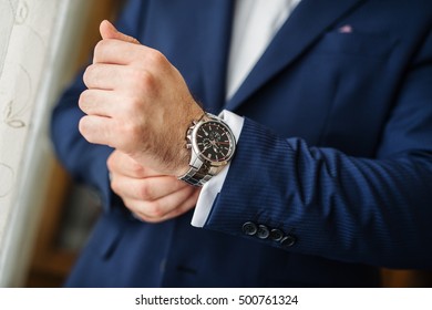 Gentleman wearing a watch.