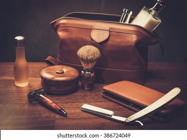 Gentleman's accessories on a luxury wooden board 