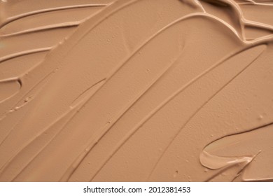 Gently Beige Strokes And Texture Of Makeup Foundation Or Acrylic Paint Isolated On White Background