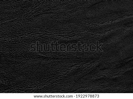 Genuine black leather texture background. Natural leather cattle skin material.