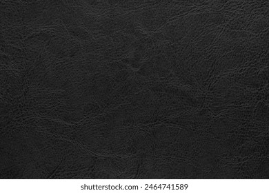 Genuine black leather texture, natural animal skin, luxury vintage cowhide background. Eco friendly leatherette, faux leather. Wallpapere, backdrop, copy space