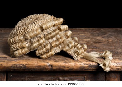 Genuine horsehair barrister's wig on an antique desk