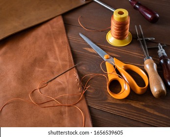 Genuine Leather. Sewing A Purse. Leather Work. Tools For Sewing Bags, Wallets, Clutches. Stitching. Manual Sewing Of The Product. The Manufacture Of Leather Products. 