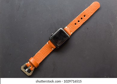 Genuine leather watch  strap with smart watch on black background - Powered by Shutterstock