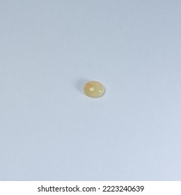 Genuine Mined Natural Opal Oval Cabochon Precious Gemstones For Design Gems Jewellery. Selective Focus Natural Opal Oval Cabochon Gemstone For Design Gold Jewelry.