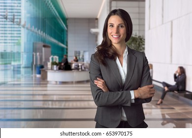 Genuine Natural Sincere Business Manager Portrait At Large Lobby Area Of Bank In Financial District