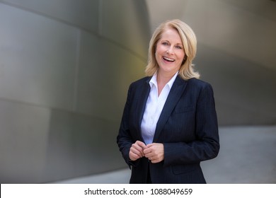 Genuine Sincere Portrait Of A Beautiful Experienced Business Woman, Investor, Professional Attire