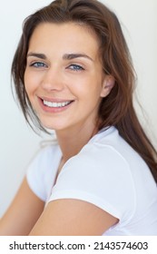 Genuine, Sweet Smile. Portrait Of A Stunning Young Woman With Smooth, Glowing Skin.