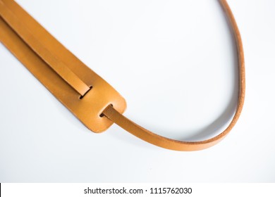 Genuine vegetable tanned leather camera strap handmade, Art craftsmansghip object - Powered by Shutterstock