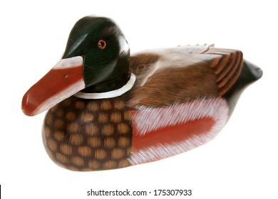 A Genuine Wooden Duck Decoy. Isolated on white with room for your text. Duck Decoys have been used for Hundreds of years to lure unsuspecting ducks to their doom by hungry duck hunters world wide 