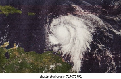 Geocolor Image in the eye of Hurricane Maria strengthened to a Category 3 just east of the Leeward Islands. Elements of this image furnished by NASA.