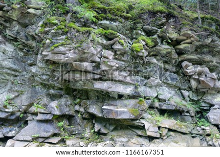 Geological section of igneous rocks close-up.