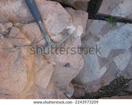 Geology Rock Hammer Laying on Rocks for Scale Photo stock © 