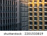 Geometric architectural background. Facade of corner apartment building. Aerial view.