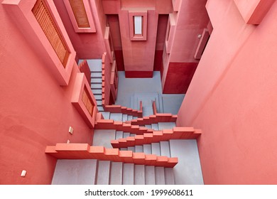 Geometric building construction. The red wall, La manzanera. Calpe, Spain