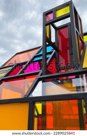 Geometric colored glass sculpture, colorful modern architecture, contemporary art