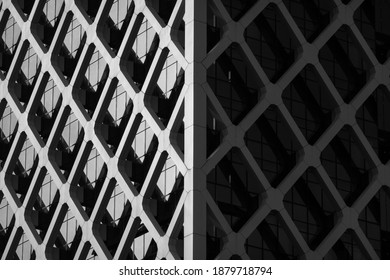 The geometric facade of a skyscraper.