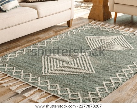 Geometric hand woven wool rug.