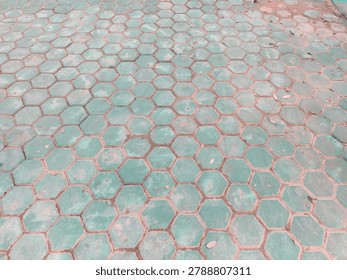 Geometric hexagon paving pattern with soft turquoise tones, delivering a modern architectural texture highly sought after for design mockups, backgrounds, and urban planning visuals.