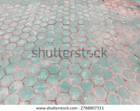 Geometric hexagon paving pattern with soft turquoise tones, delivering a modern architectural texture highly sought after for design mockups, backgrounds, and urban planning visuals.