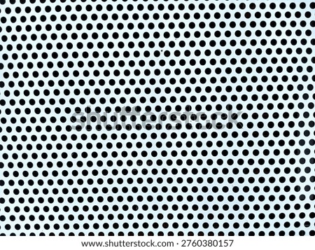 Geometric Hole Pattern on Metallic Panel Abstract Industrial Background