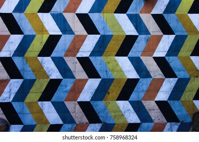 Geometric mural with worn paint, yellow, black, orange and white - Shutterstock ID 758968324