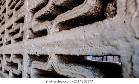 geometric pattern etched into a concrete surface