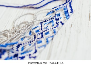Geometric pattern on the gerdan ornament, Ukrainian beaded ornament, amulet.