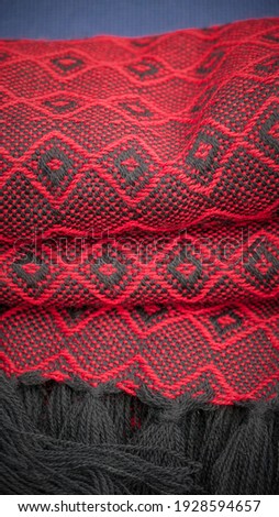 Geometric pattern in red and black cloth