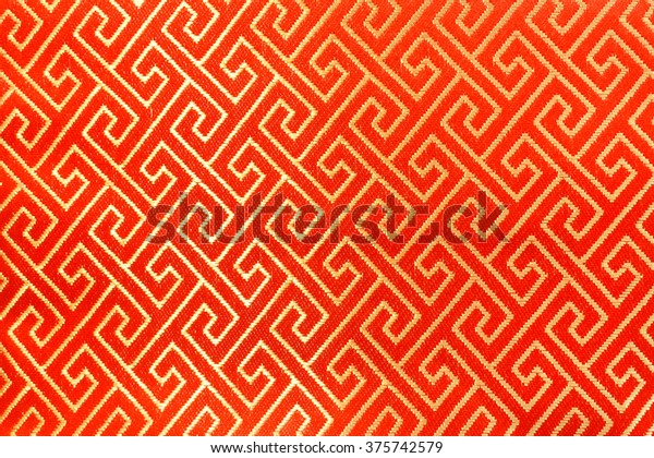 Geometric Pattern in red and\
gold, Chinese style, Texture of Embroidery Pillowcase (not\
vector)