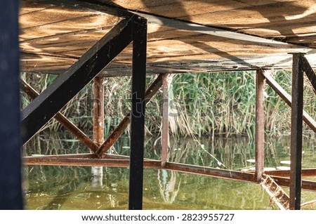 Geometric Perspective of Steel Framework Beneath Wooden Dock