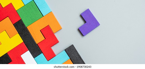 geometric shape block with colorful wood puzzle piece background. logical thinking, business logic, Conundrum, decision, solutions, rational, mission, success, goals and strategy concepts - Shutterstock ID 1908730243