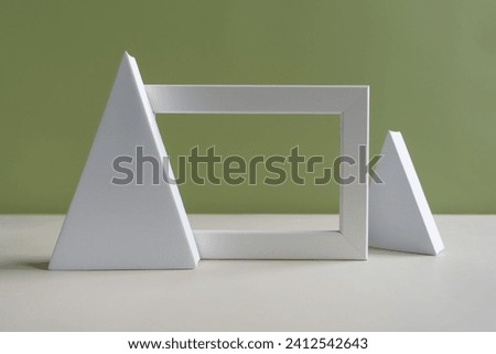 Geometric shapes in composition. abstract background with geometric shapes on a green background.