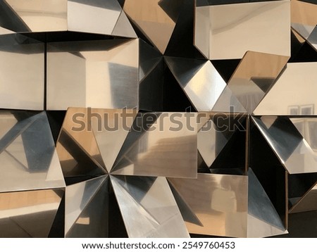 Geometric square and triangular pattern forming an abstract design. Shiny mirrored effect, bronze, black and gold.
