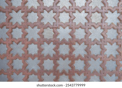 Geometric star-patterned tile design with interlocking shapes in earthy tones, creating a textured effect. - Powered by Shutterstock