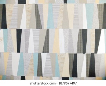 Geometric triangle pattern wallpaper black white cream light blue