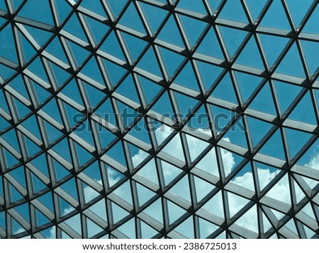 geometric triangular glass ceiling background 