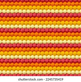 Geometric volumetric seamless knitted pattern in the form bumps  The texture is crocheted from multi  colored yarn  Analog color combination 