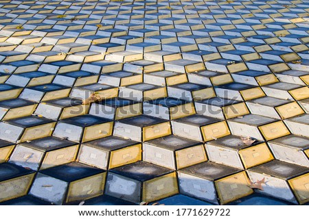 Geometry cubes optical illusion floor in the park of Tbilisi. Geometry figure background.