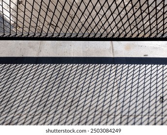 Geomtric pattern gate background with its shadows 